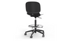 arhus Swivel Counter Stool by Quell Design in black positioned around a modern kitchen island with wooden countertops and pendant lighting. Featuring a smooth moulded polypropylene seat, adjustable gas-lift height, 360-degree swivel, integrated footrest ring, and sturdy five-star base, this Scandinavian-inspired stool blends ergonomic comfort with minimalist contemporary style for residential and commercial interiors.