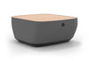 Byorne Modular Coffee Table upholstered in premium linen fabric, available in dusty teal, dark grey and pebble grey. Designed to complement modular seating layouts, it features durable injection-moulded nylon legs for a lightweight yet stable base, integrated USB charging for convenient connectivity and a clean contemporary aesthetic suited to a variety of interiors.