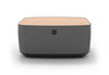 Byorne Modular Coffee Table upholstered in premium linen fabric, available in dusty teal, dark grey and pebble grey. Designed to complement modular seating layouts, it features durable injection-moulded nylon legs for a lightweight yet stable base, integrated USB charging for convenient connectivity and a clean contemporary aesthetic suited to a variety of interiors.