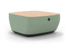 Byorne Modular Coffee Table upholstered in premium linen fabric, available in dusty teal, dark grey and pebble grey. Designed to complement modular seating layouts, it features durable injection-moulded nylon legs for a lightweight yet stable base, integrated USB charging for convenient connectivity and a clean contemporary aesthetic suited to a variety of interiors.