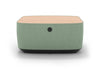 Byorne Modular Coffee Table upholstered in premium linen fabric, available in dusty teal, dark grey and pebble grey. Designed to complement modular seating layouts, it features durable injection-moulded nylon legs for a lightweight yet stable base, integrated USB charging for convenient connectivity and a clean contemporary aesthetic suited to a variety of interiors.