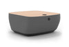 Byorne Connected Modular Coffee Table shown in dusty teal, dark grey and pebble grey finishes, featuring durable linen fabric upholstery, softly rounded edges and an injection moulded nylon leg for stability. Designed as part of a modular seating system, the table includes integrated USB ports and wireless charging to support modern work and lounge environments while maintaining a clean, contemporary aesthetic suitable for collaborative offices, reception areas and breakout spaces.