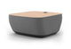 Byorne Connected Modular Coffee Table shown in dusty teal, dark grey and pebble grey finishes, featuring durable linen fabric upholstery, softly rounded edges and an injection moulded nylon leg for stability. Designed as part of a modular seating system, the table includes integrated USB ports and wireless charging to support modern work and lounge environments while maintaining a clean, contemporary aesthetic suitable for collaborative offices, reception areas and breakout spaces.