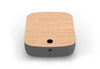 Byorne Connected Modular Coffee Table shown in dusty teal, dark grey and pebble grey finishes, featuring durable linen fabric upholstery, softly rounded edges and an injection moulded nylon leg for stability. Designed as part of a modular seating system, the table includes integrated USB ports and wireless charging to support modern work and lounge environments while maintaining a clean, contemporary aesthetic suitable for collaborative offices, reception areas and breakout spaces.