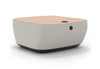 Byorne Connected Modular Coffee Table shown in dusty teal, dark grey and pebble grey finishes, featuring durable linen fabric upholstery, softly rounded edges and an injection moulded nylon leg for stability. Designed as part of a modular seating system, the table includes integrated USB ports and wireless charging to support modern work and lounge environments while maintaining a clean, contemporary aesthetic suitable for collaborative offices, reception areas and breakout spaces.