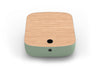 Byorne Connected Modular Coffee Table shown in dusty teal, dark grey and pebble grey finishes, featuring durable linen fabric upholstery, softly rounded edges and an injection moulded nylon leg for stability. Designed as part of a modular seating system, the table includes integrated USB ports and wireless charging to support modern work and lounge environments while maintaining a clean, contemporary aesthetic suitable for collaborative offices, reception areas and breakout spaces.