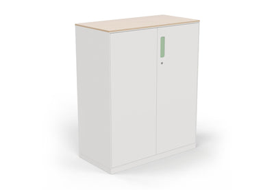 Moda Office Storage Cabinet shown on a white background. This modern storage cabinet features a durable electrostatic powder-coated surface, ABS handles, damping buffer hinges, a front lock, and a laminate top, providing stylish, secure, and functional storage for office and collaborative environments.