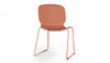 Aarhus Bistro Glide Stackable Chair by Quell Design – sculptural modern chair in coral moulded polypropylene shell and sleek electrostatic powder-coated steel frame. The ergonomic, contoured seat offers comfort while its stackable design makes it perfect for dynamic office, café or communal spaces.